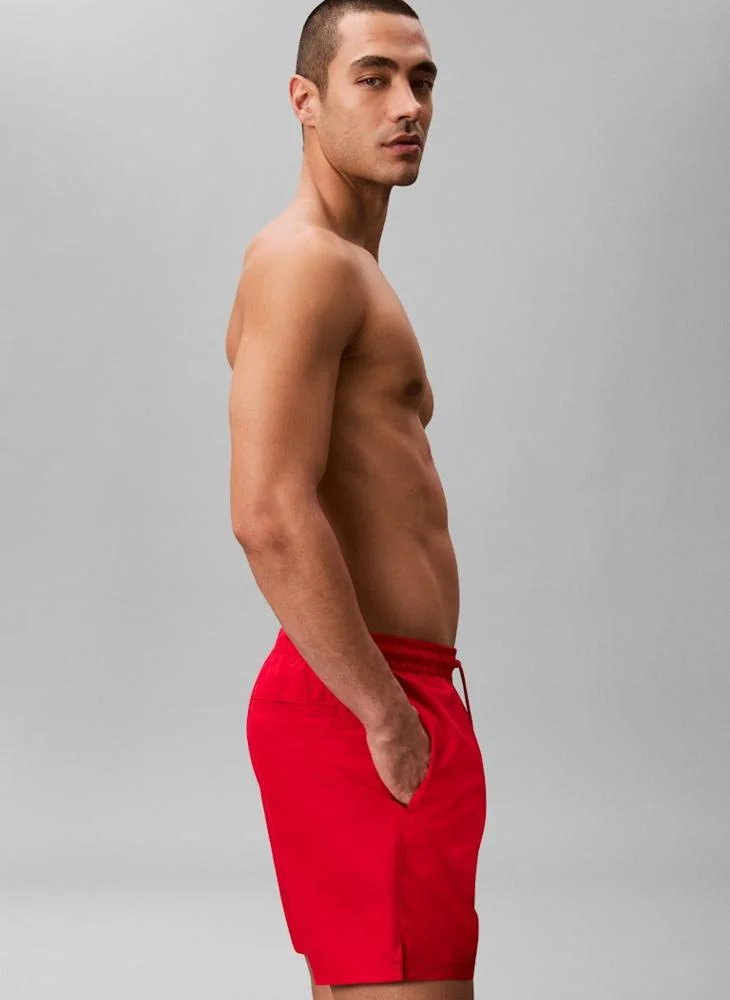 CALVIN KLEIN  Solid Swim Shorts for Men | Best Price UAE